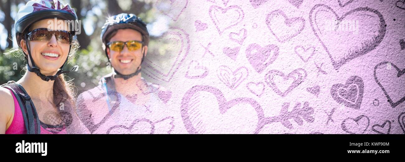 Coppia ciclabile con i cuori di transizione di amore di San Valentino Foto Stock