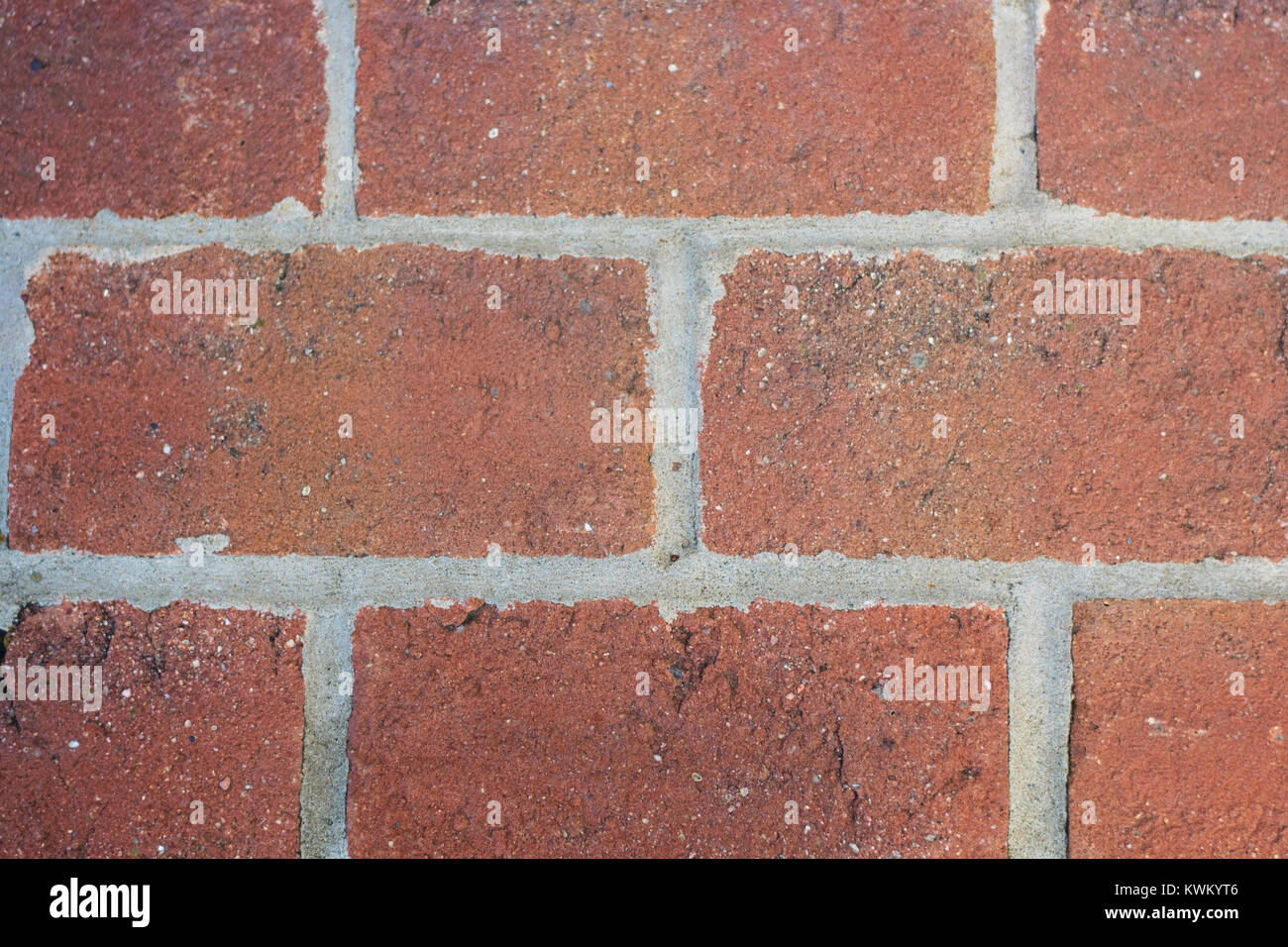 Close-up di mattoni con malta, muro di mattoni Foto Stock