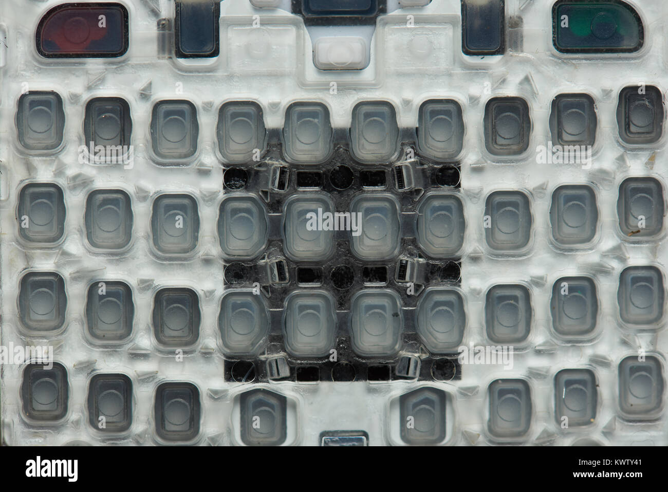 Pulsanti in gomma per dispositivo digitale close up. Lato posteriore del pannello del pulsante Foto Stock