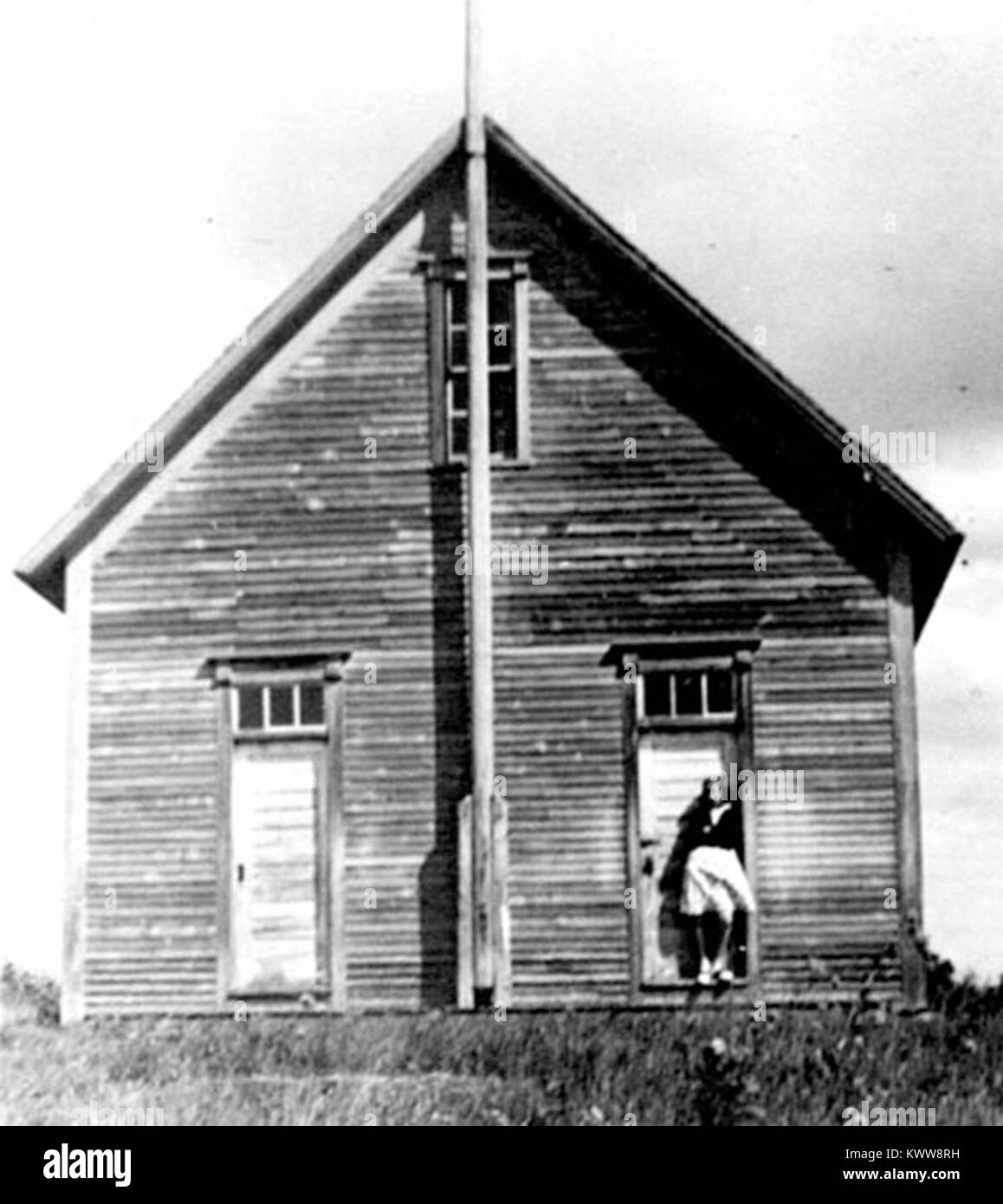 Questa fotografia del 1938 mostra un edificio scolastico nell'insediamento di Gregg, raffigurante le infrastrutture educative rurali dei primi anni del XX secolo e l'impegno della comunità per la scuola pubblica. Foto Stock