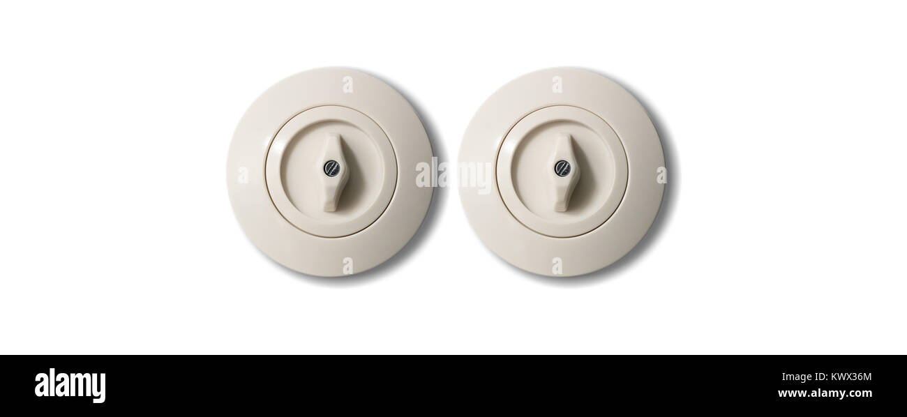 Due interruttori vintage rotondo con pulsante da porcellana isolati su  sfondo bianco. Vista ravvicinata, dettaglio Foto stock - Alamy