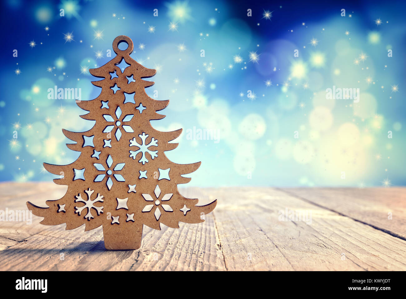 Albero di Natale decorazioni in legno sfondo Foto Stock