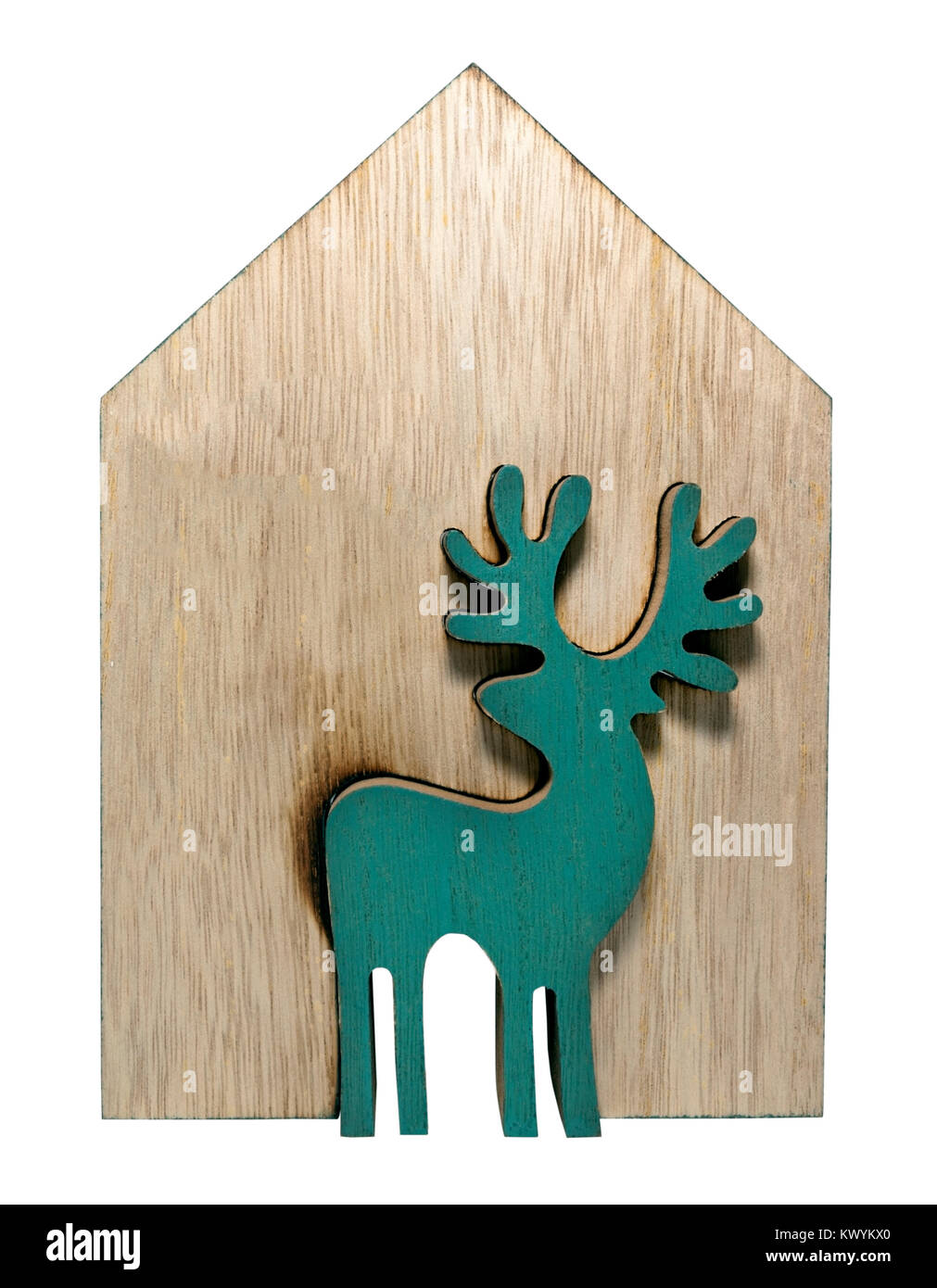 Legno ornamento di renne con casa. Foto Stock