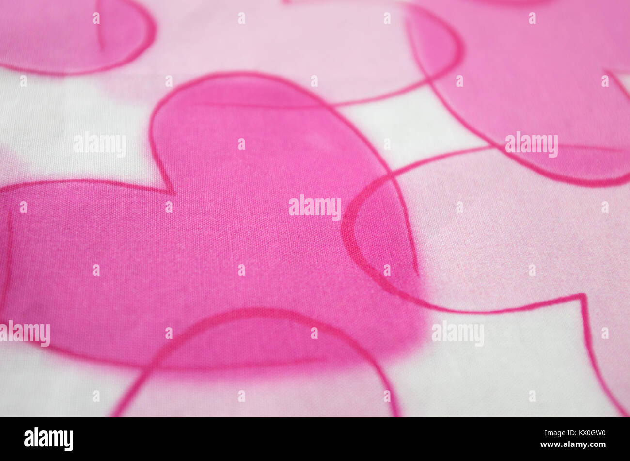 Incastro Cuori rosa su tessuto Foto Stock