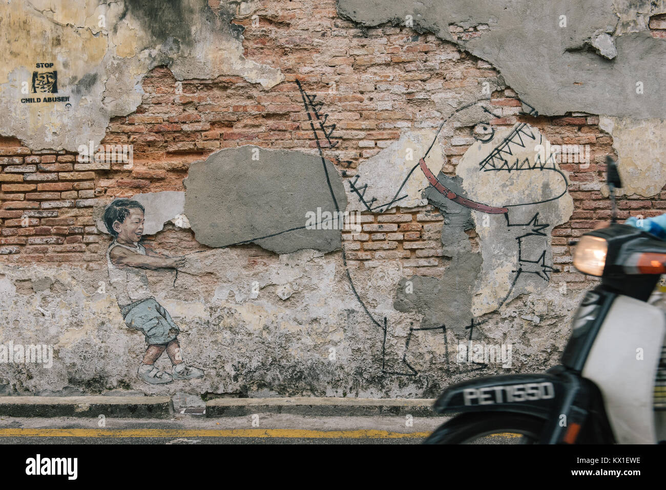 Arte di strada da Ernest Zacharevic in Georgetown, Penang, Malaysia. Foto Stock