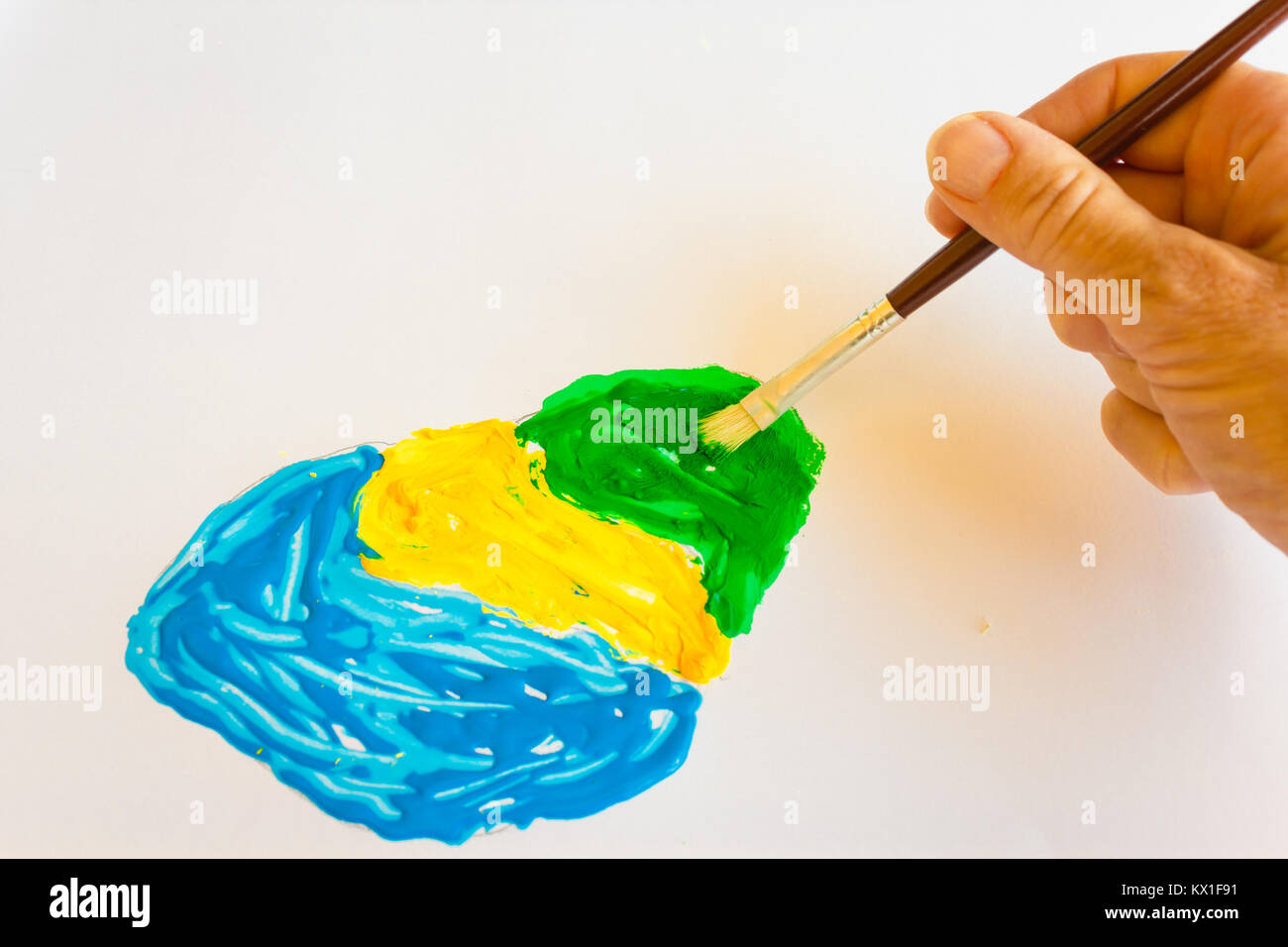 Il verde è un colore secondario che è nato dalla miscelazione di due colori primari : blu con giallo / verde della storia a colori Foto Stock