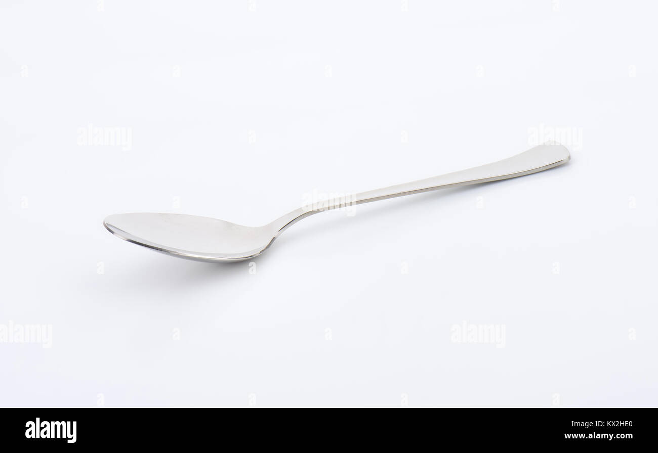 Tabella vuota cucchiaio su sfondo bianco Foto Stock
