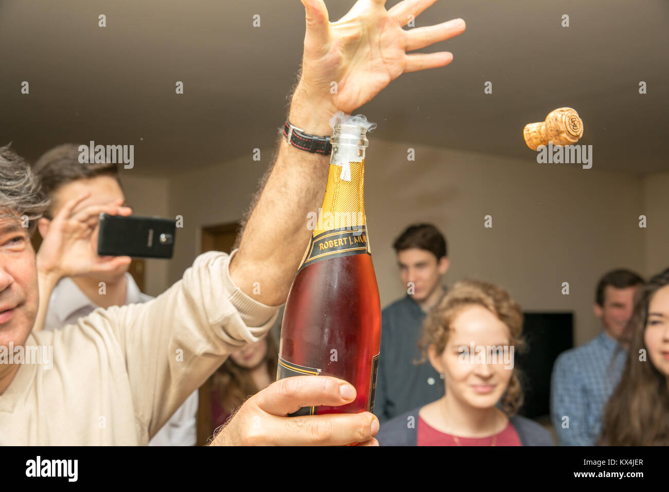 Festa di famiglia e di celebrazione di champagne Foto Stock