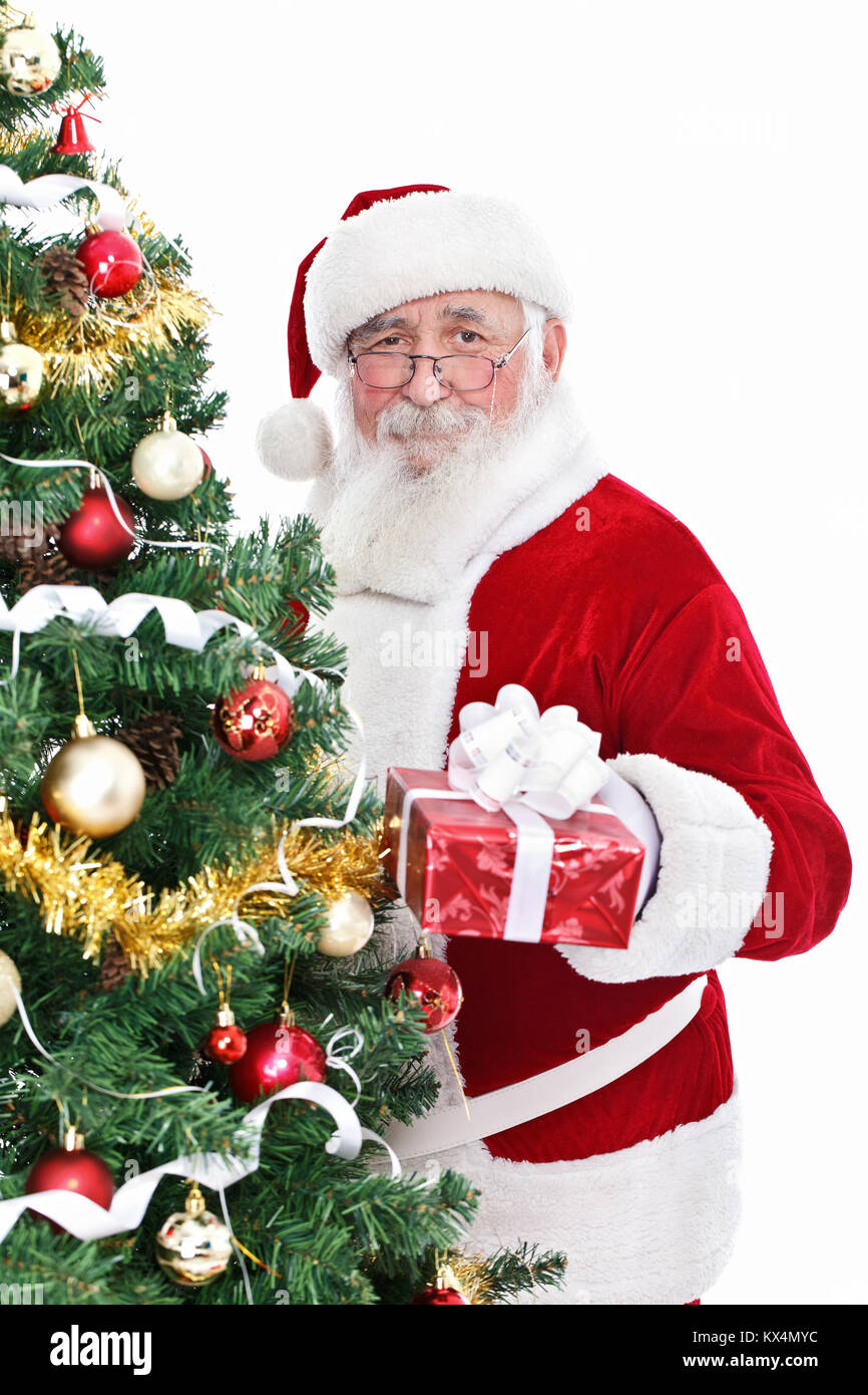 Sorridente Babbo Natale con la barba reale azienda regalo per Natale Foto Stock