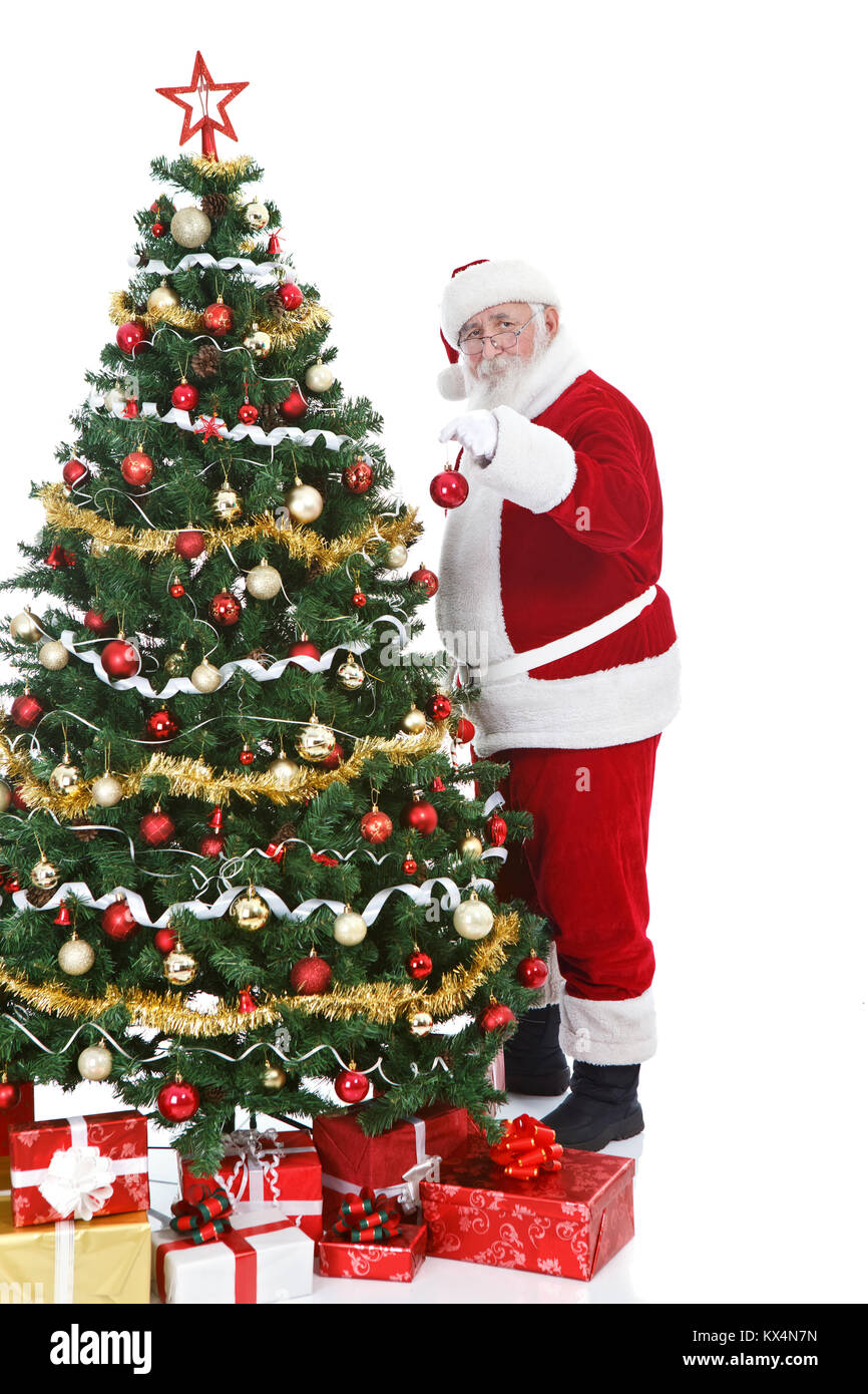 Vero Babbo Natale tenendo palla di Natale e la decorazione di albero di Natale, isolato su sfondo bianco Foto Stock