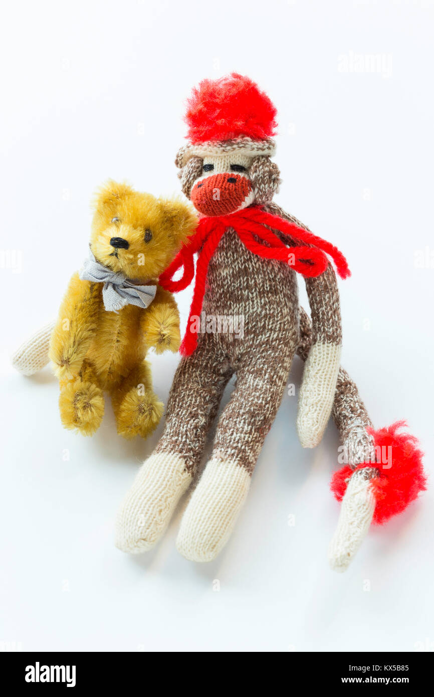 Orsacchiotto di peluche e calza Monkey Still Life Foto Stock