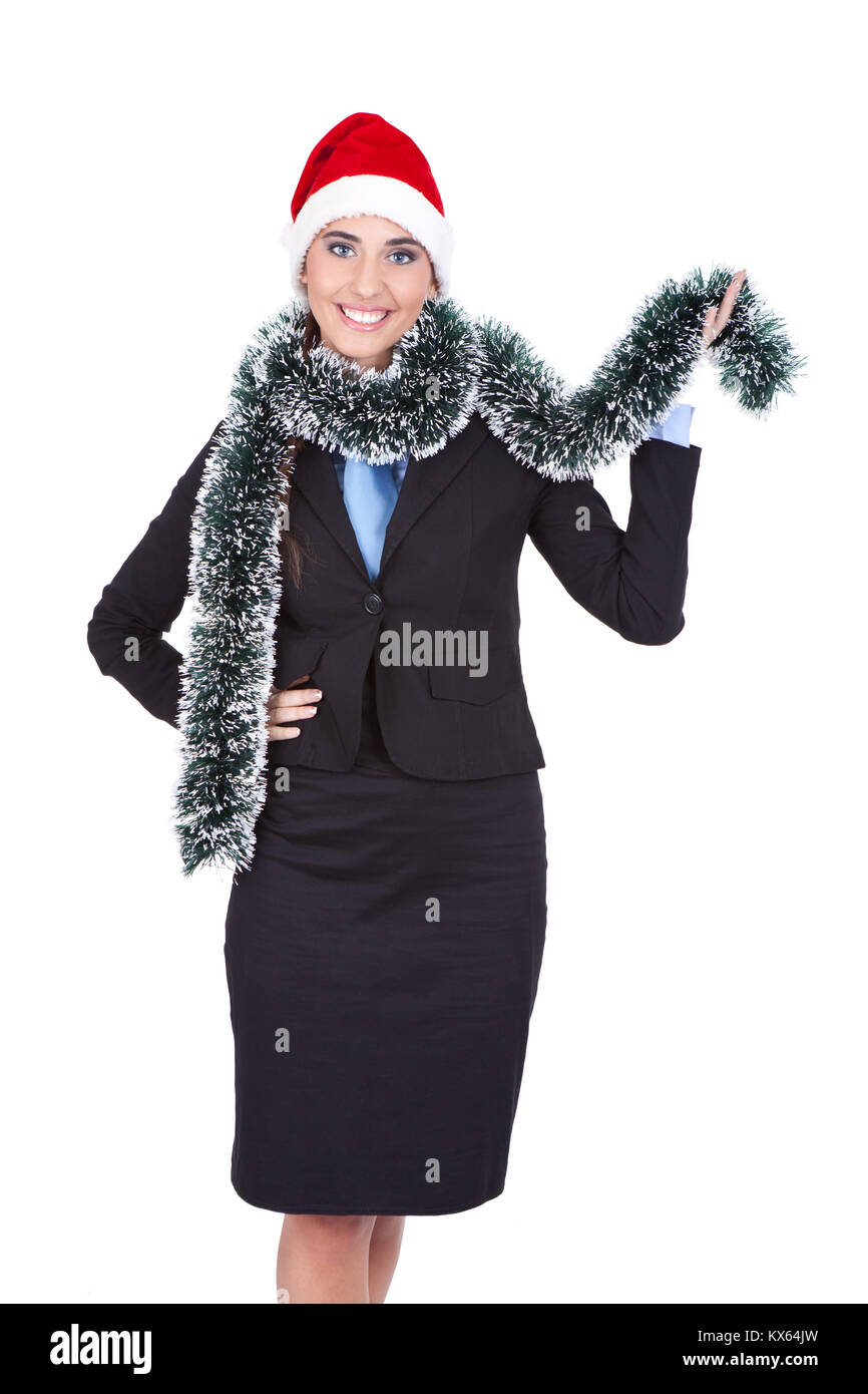 Bella donna che indossa business suit e santa hat , isolato su sfondo bianco Foto Stock