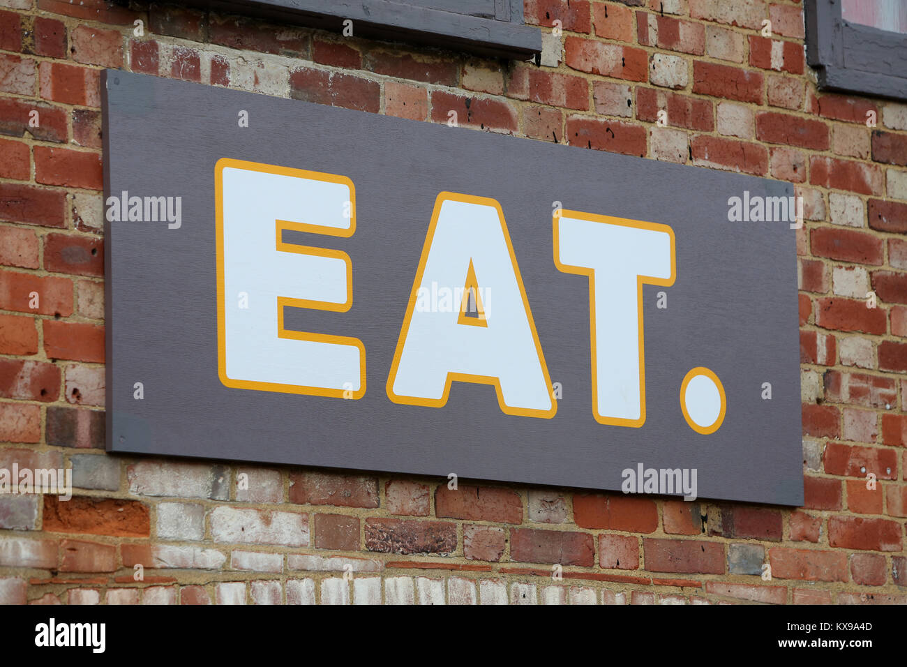 Mangiare Cafe sign in Chichester, West Sussex, Regno Unito. Foto Stock