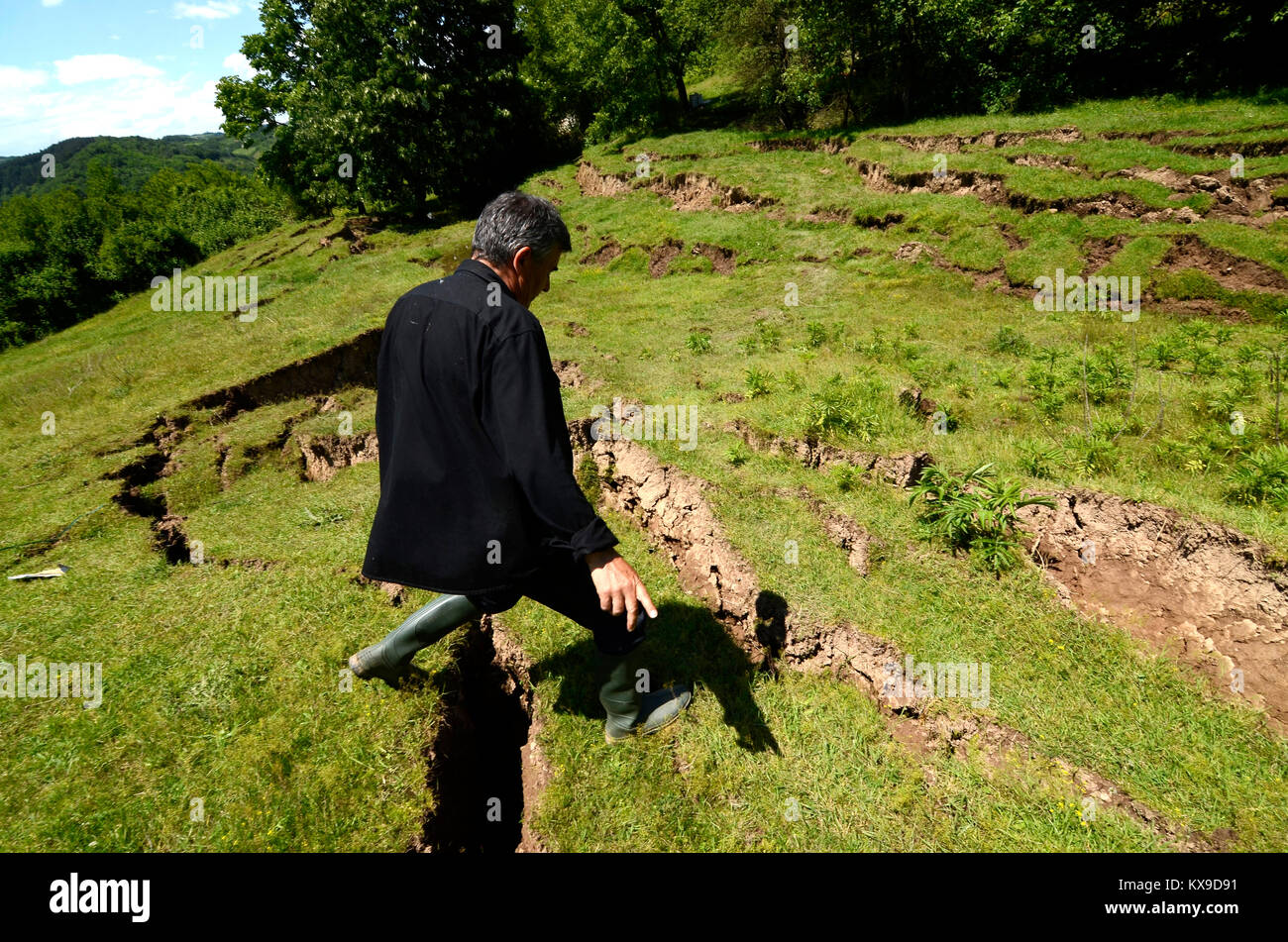 Diapositive di terra sulla collina Foto Stock