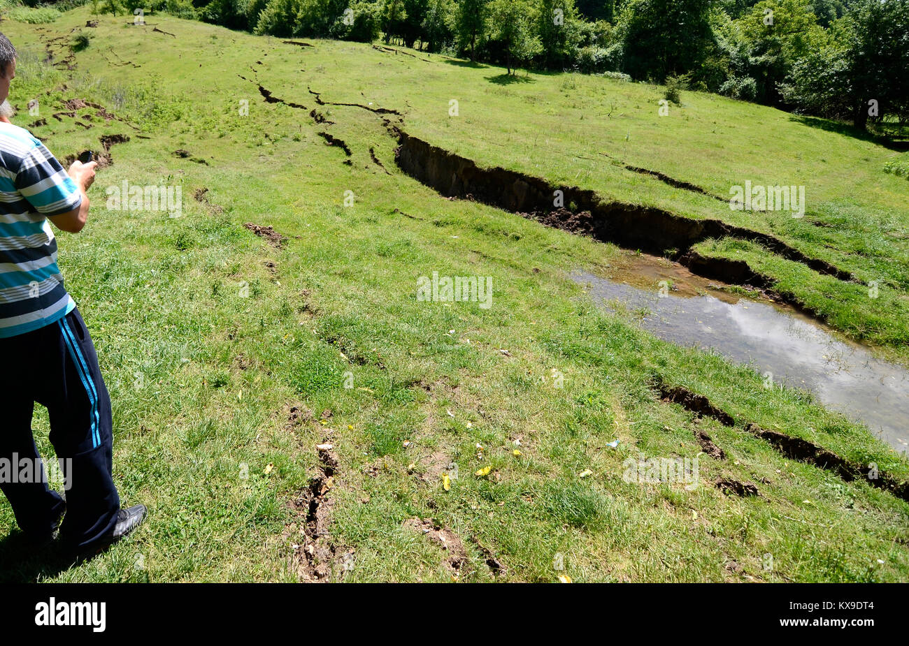Diapositive di terra sulla collina Foto Stock