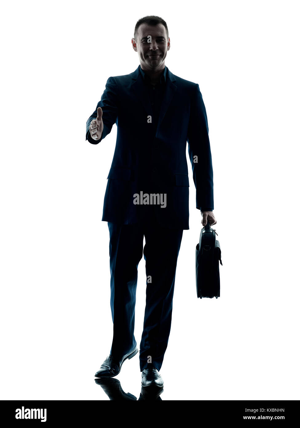 Un caucasian business man walking silhouette isolati su sfondo bianco Foto Stock