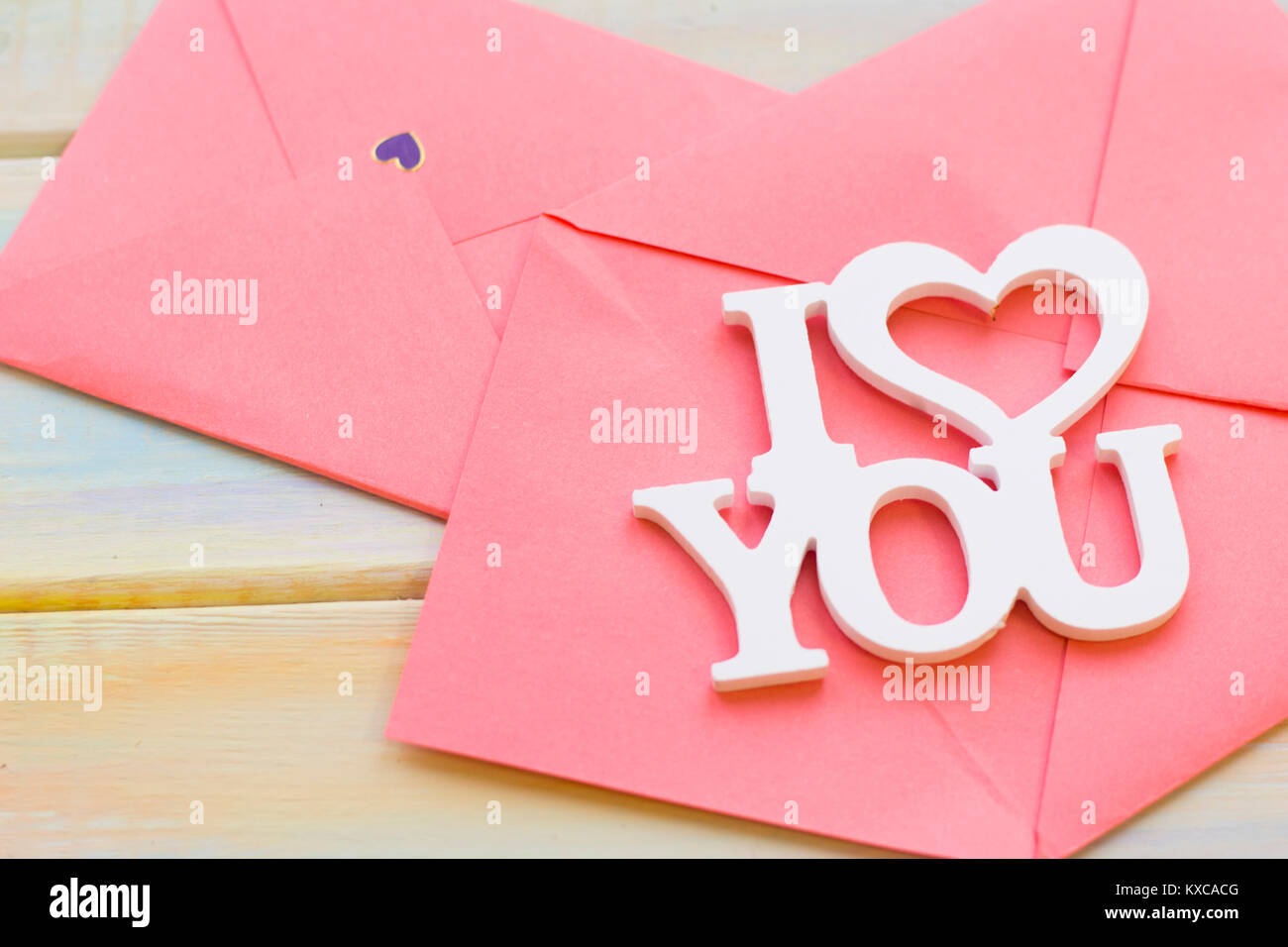 Buste rosa e ti amo iscrizione Foto Stock