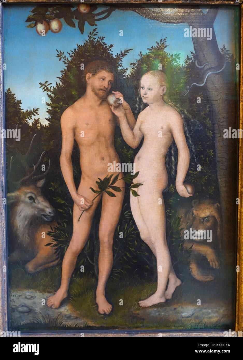 Lucas Cranach *Adamo ed Eva* (1533) è un capolavoro rinascimentale scolpito su legno di faggio rosso, che illustra la storia biblica dei primi umani. È ospitato al Gemäldegalerie di Berlino. Foto Stock