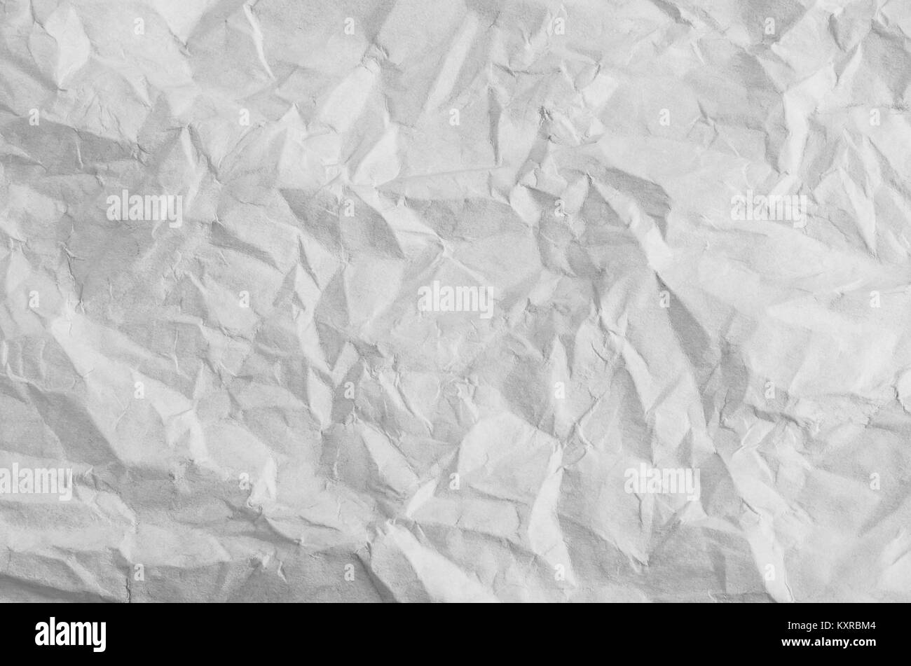 Spiegazzato, piegato e disteso white paper texture di sfondo. Foto Stock