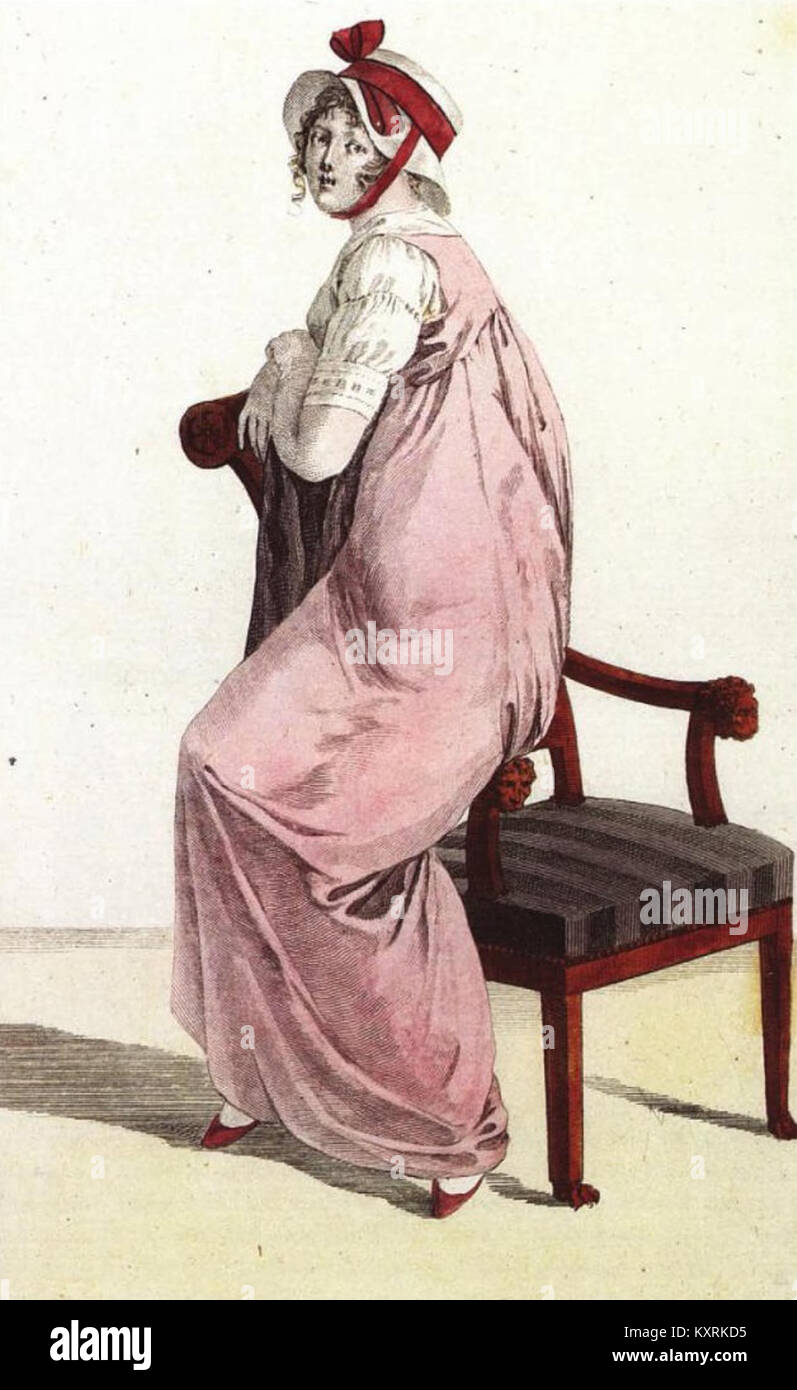 Uno storico costume parigino del 1801-1802, con il Chapeau à la Paméla, un cappello dell'epoca dell'Impero francese, che mette in risalto le tendenze della moda del periodo. Foto Stock