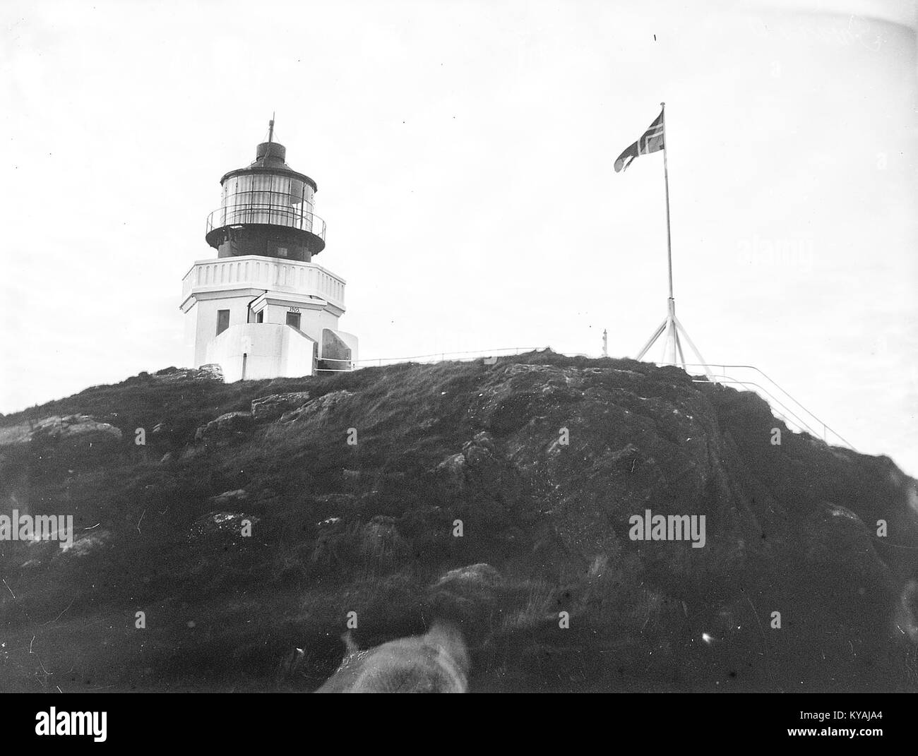 Una fotografia di Svinøy, Herøy, Møre og Romsdal, che mostra il paesaggio costiero e l'ambiente naturale della regione. Foto Stock