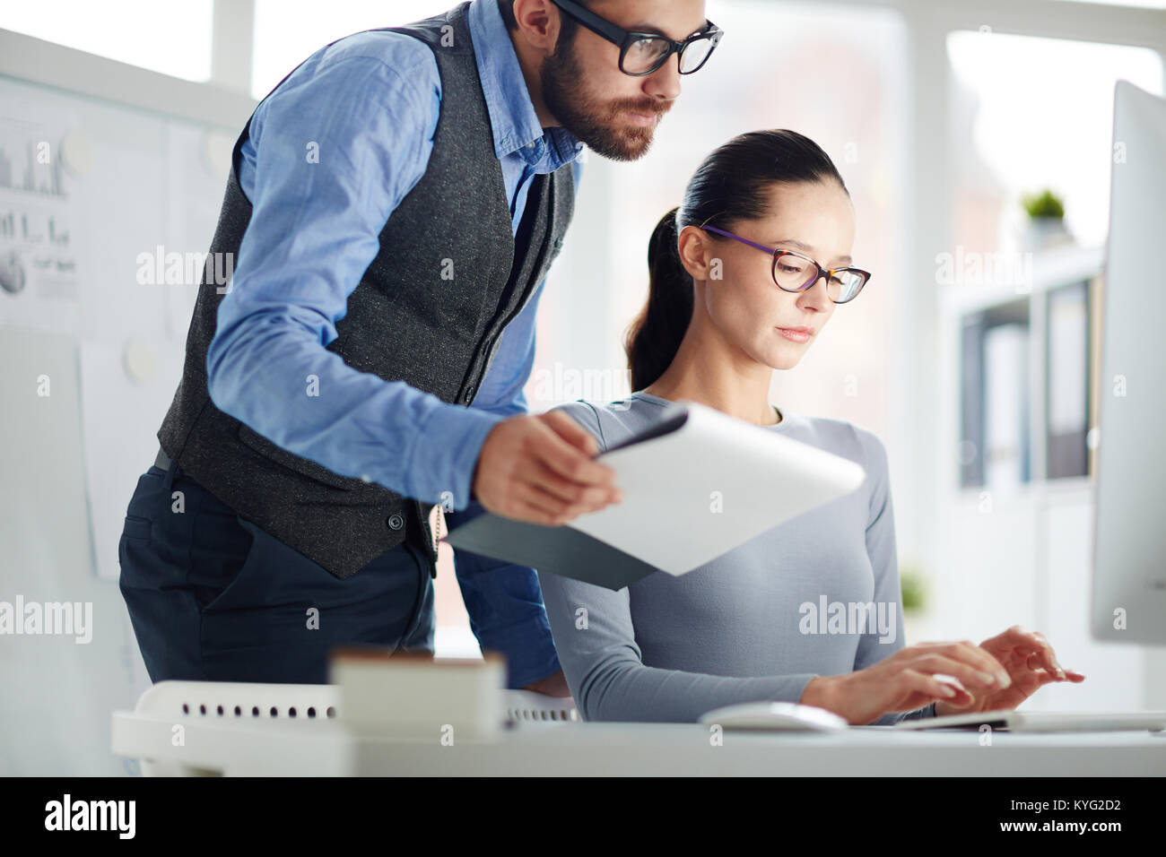 Manager che lavorano Foto Stock