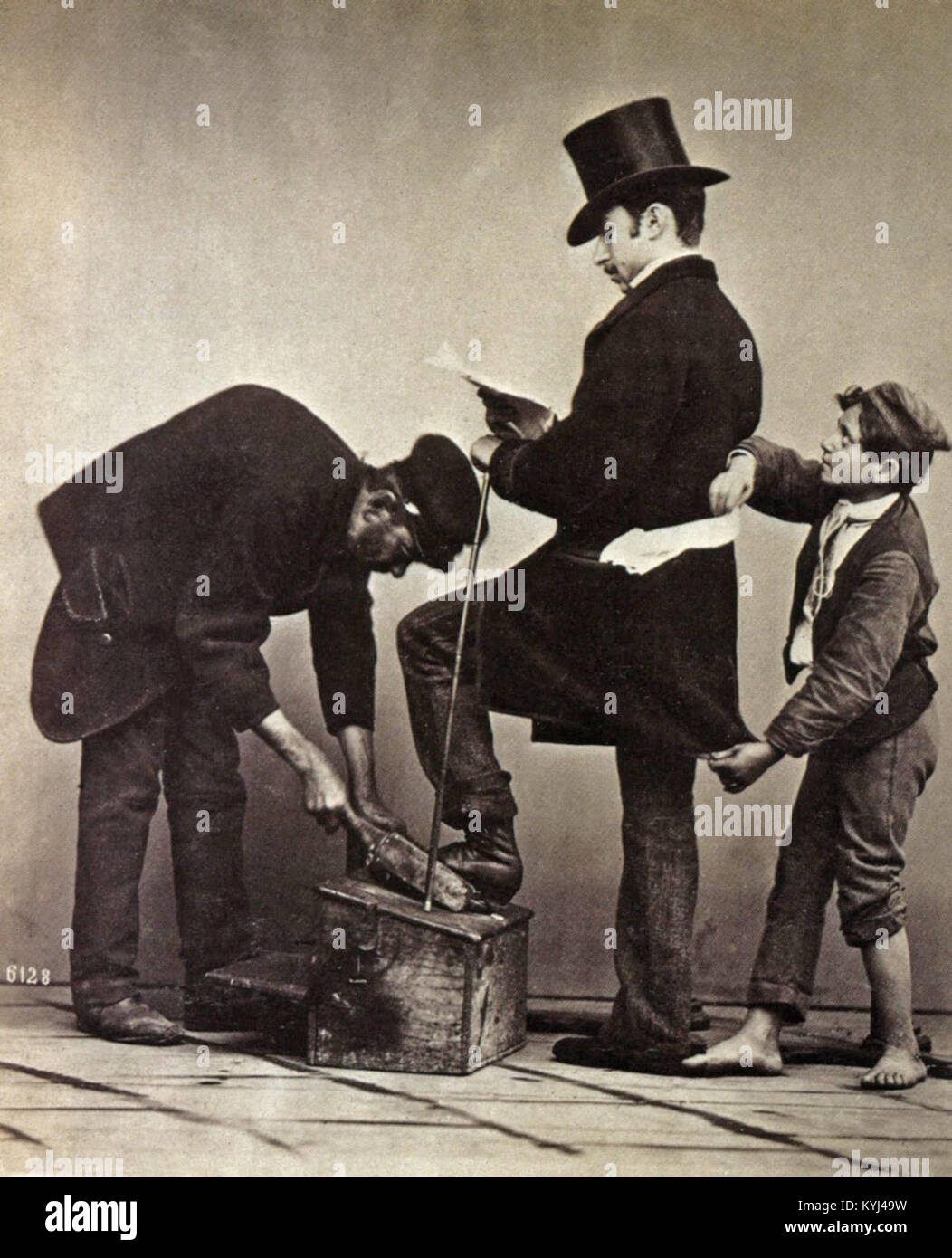 Il dipinto di Giorgio Sommer "Cireur de bottes et voleur" raffigura un bootblack e un ladro, che riflette la classe sociale e la vita quotidiana urbana nell'Europa del XIX secolo. Foto Stock