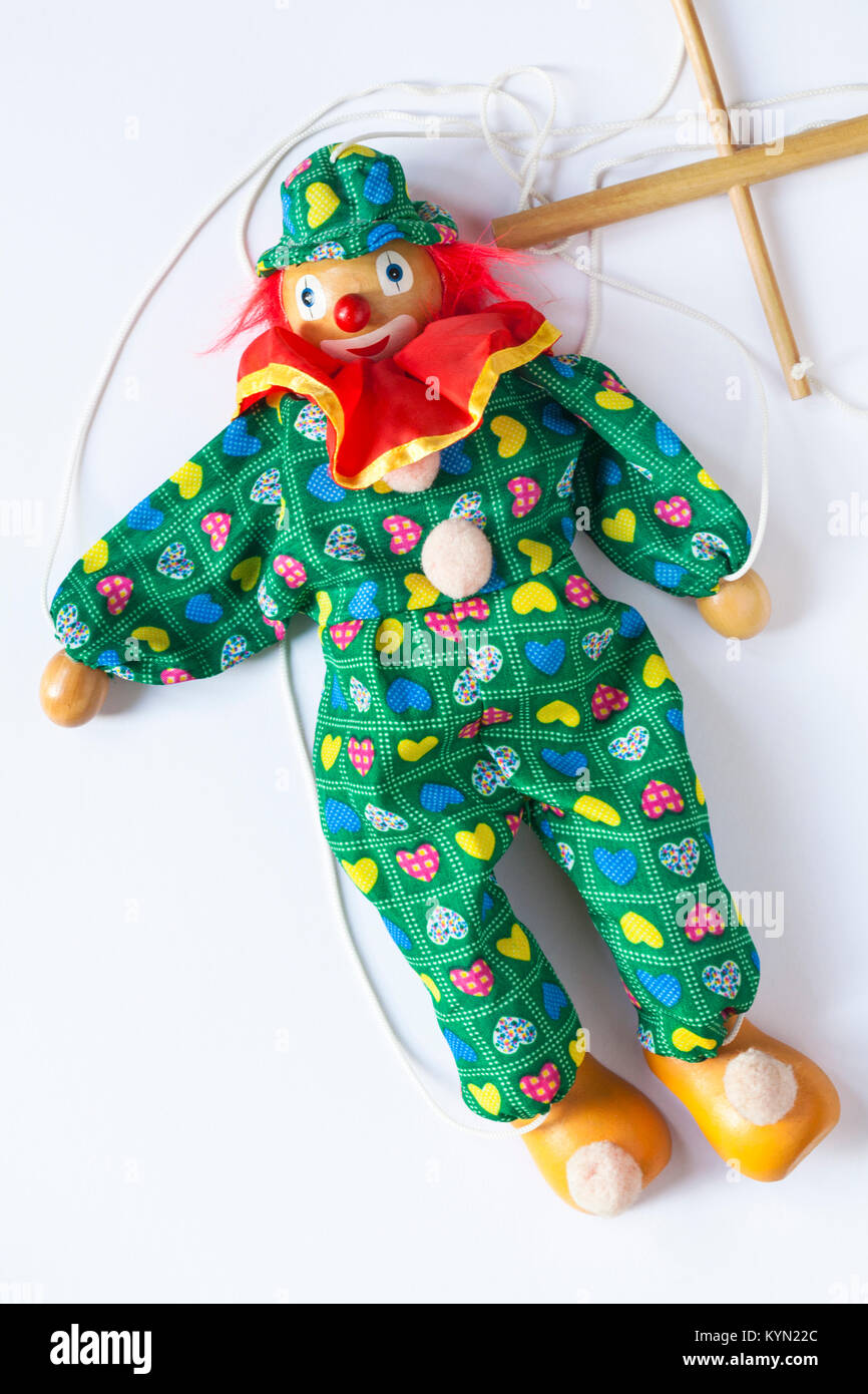 Clown puppet con stringhe impostato su sfondo bianco Foto Stock