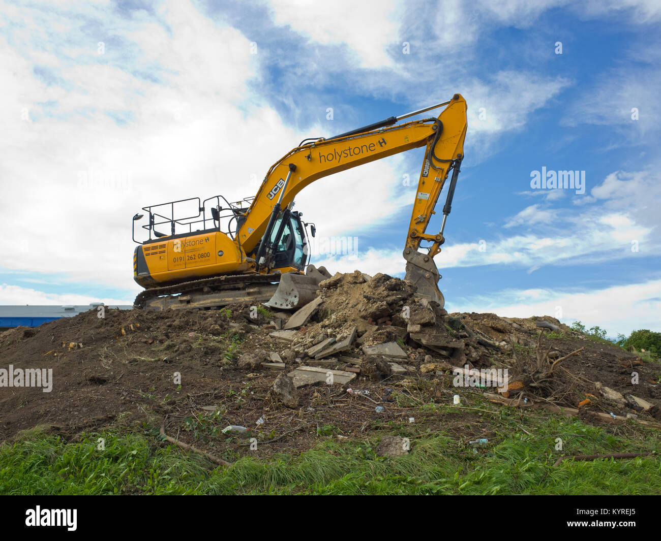 Movimento terra attrezzature impianto JCB costruzione sito massa pesante lavoro Foto Stock