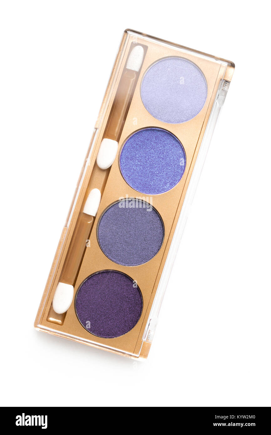 Vista superiore del caso con differenti ombreggiato viola occhio cosmetici ombre isolato su bianco Foto Stock