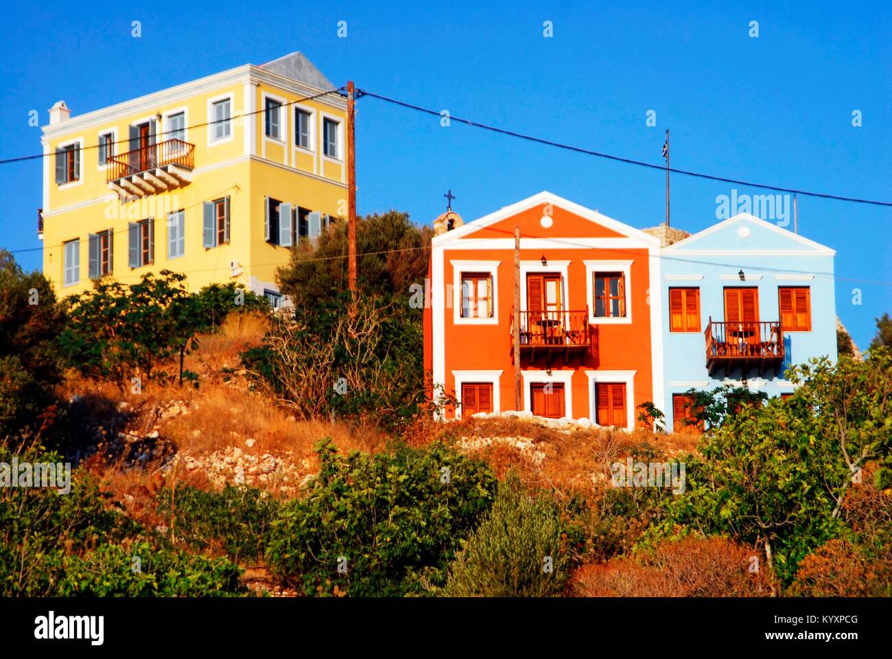 Casa Tradizionale presso il porto della città di Kastellorizo, isola di Kastellorizo, isole Dodecanesi, Grecia. Foto Stock