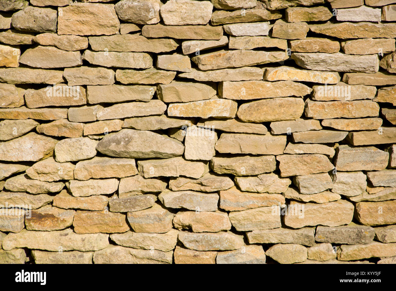 Cotswold stalattite parete piena di sfondo del telaio vicino fino Foto Stock