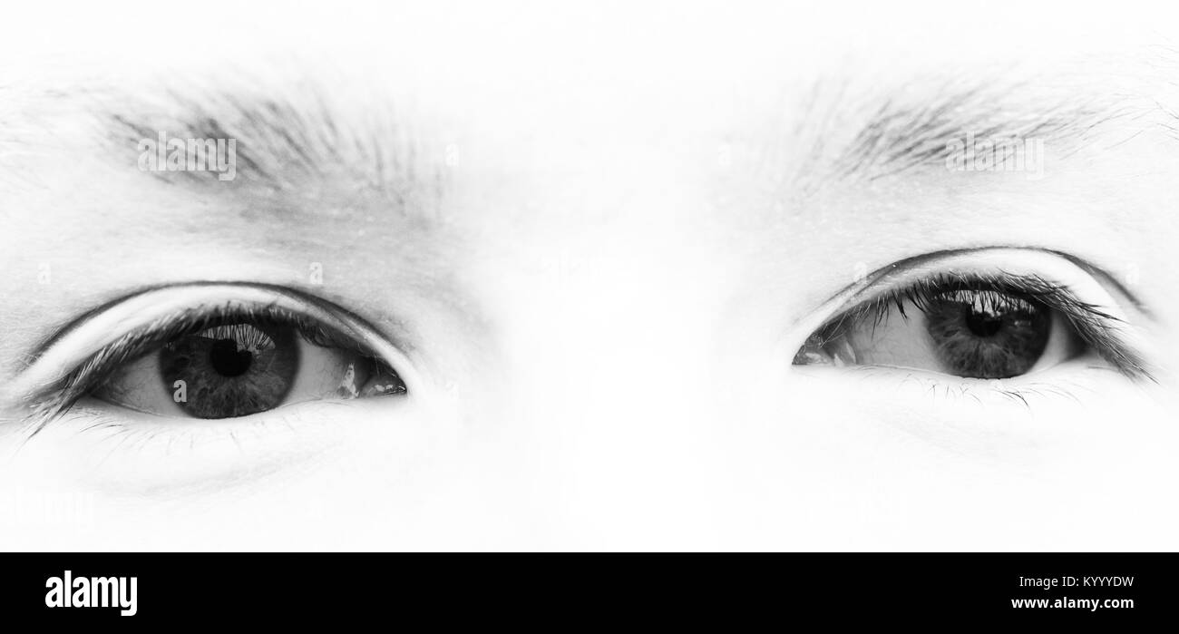 Gli occhi di maschio sovraesposte in bianco e nero Foto Stock