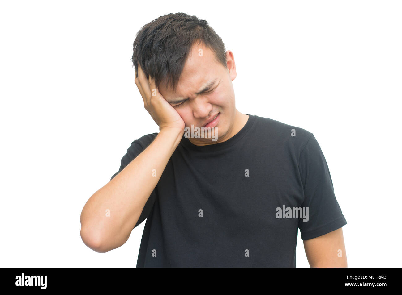 Frustrati giovane con un mal di testa - Isolato su sfondo bianco con tracciato di ritaglio Foto Stock