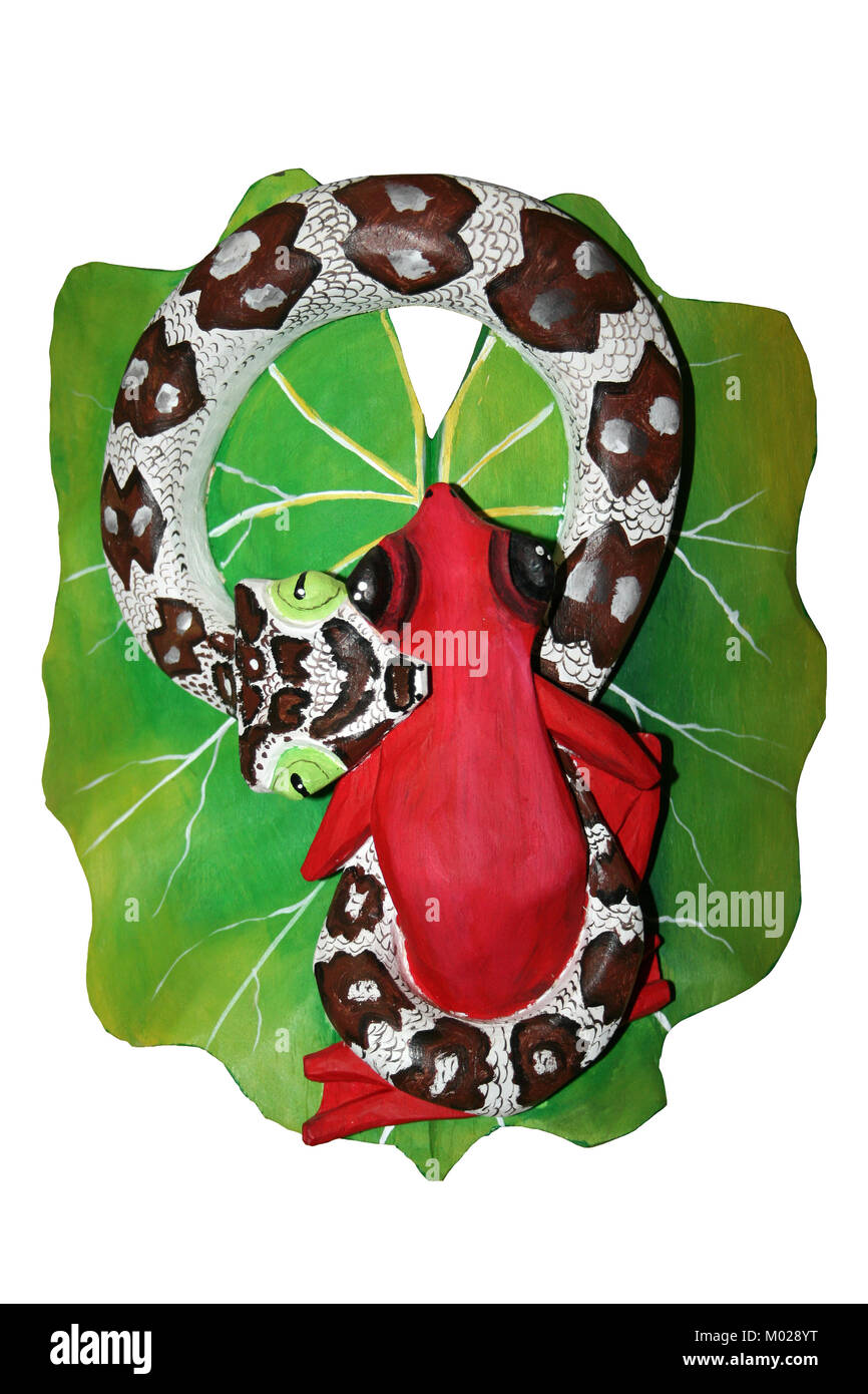 Costa Rica Boruca placca indiana con Snake mangiare rana rossa Foto Stock
