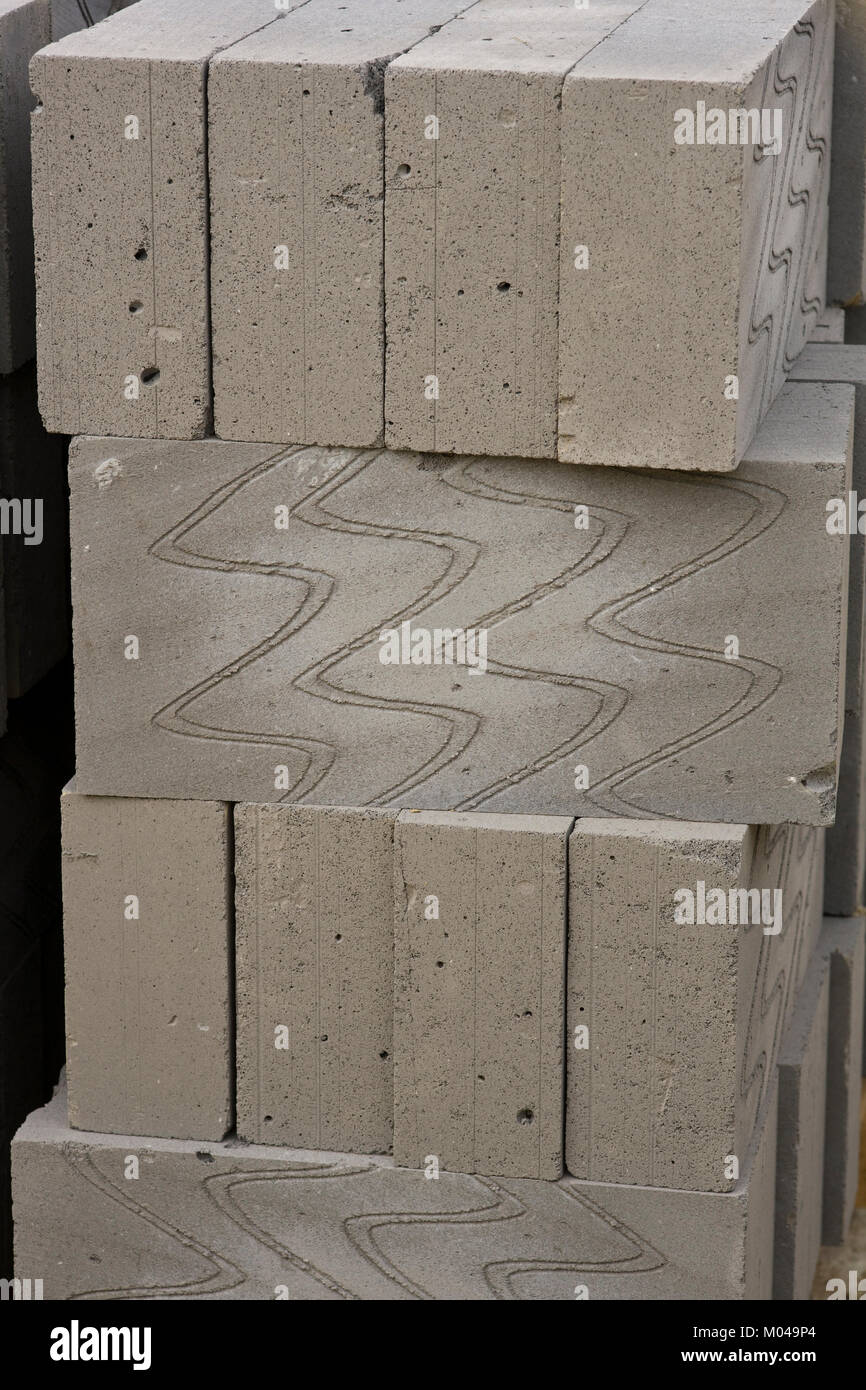 Pila di leggero edificio termale blocchi semi sfondo astratto Foto Stock