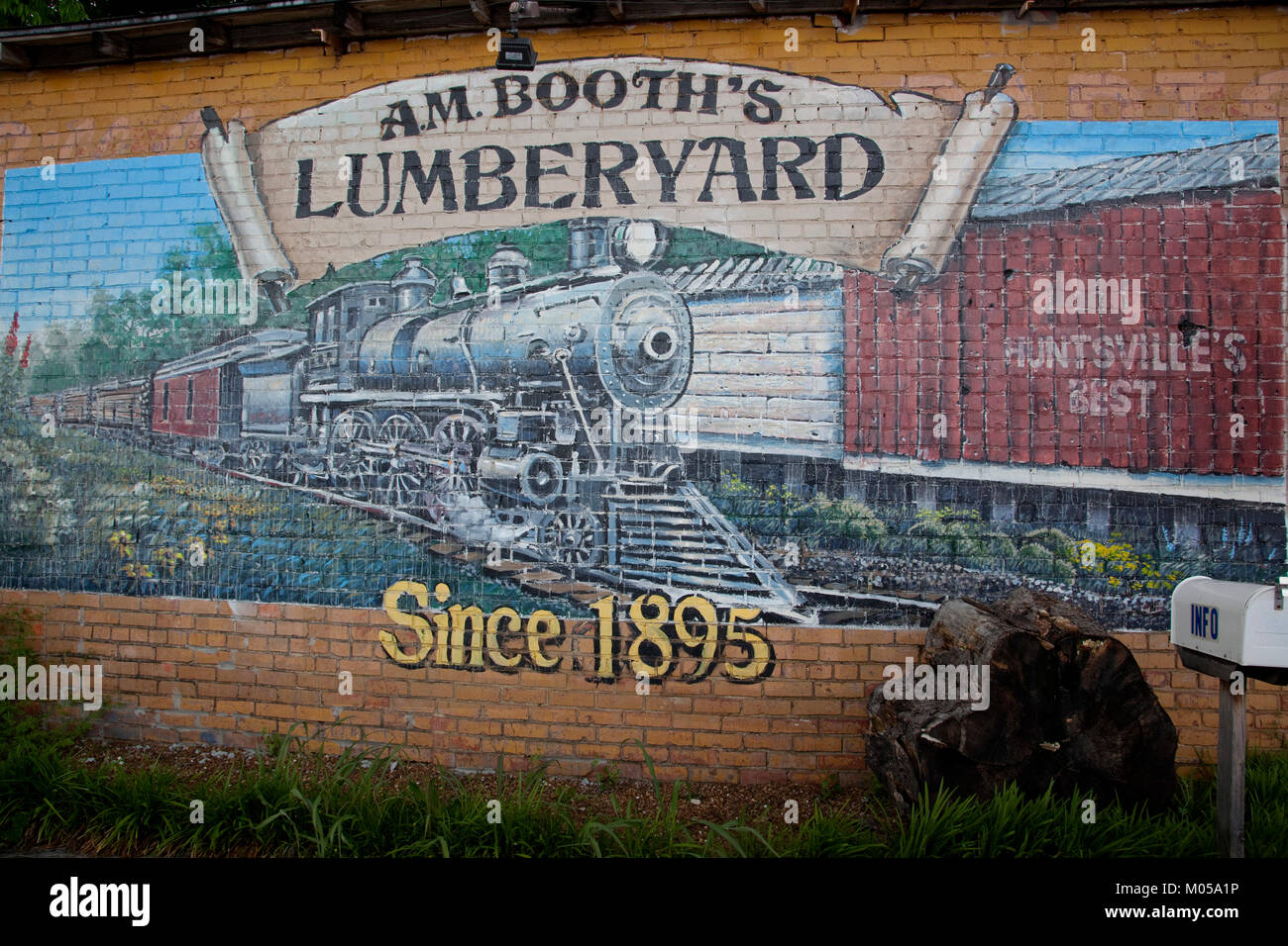 A.M. Booth's lumberyard murale in treno Foto Stock