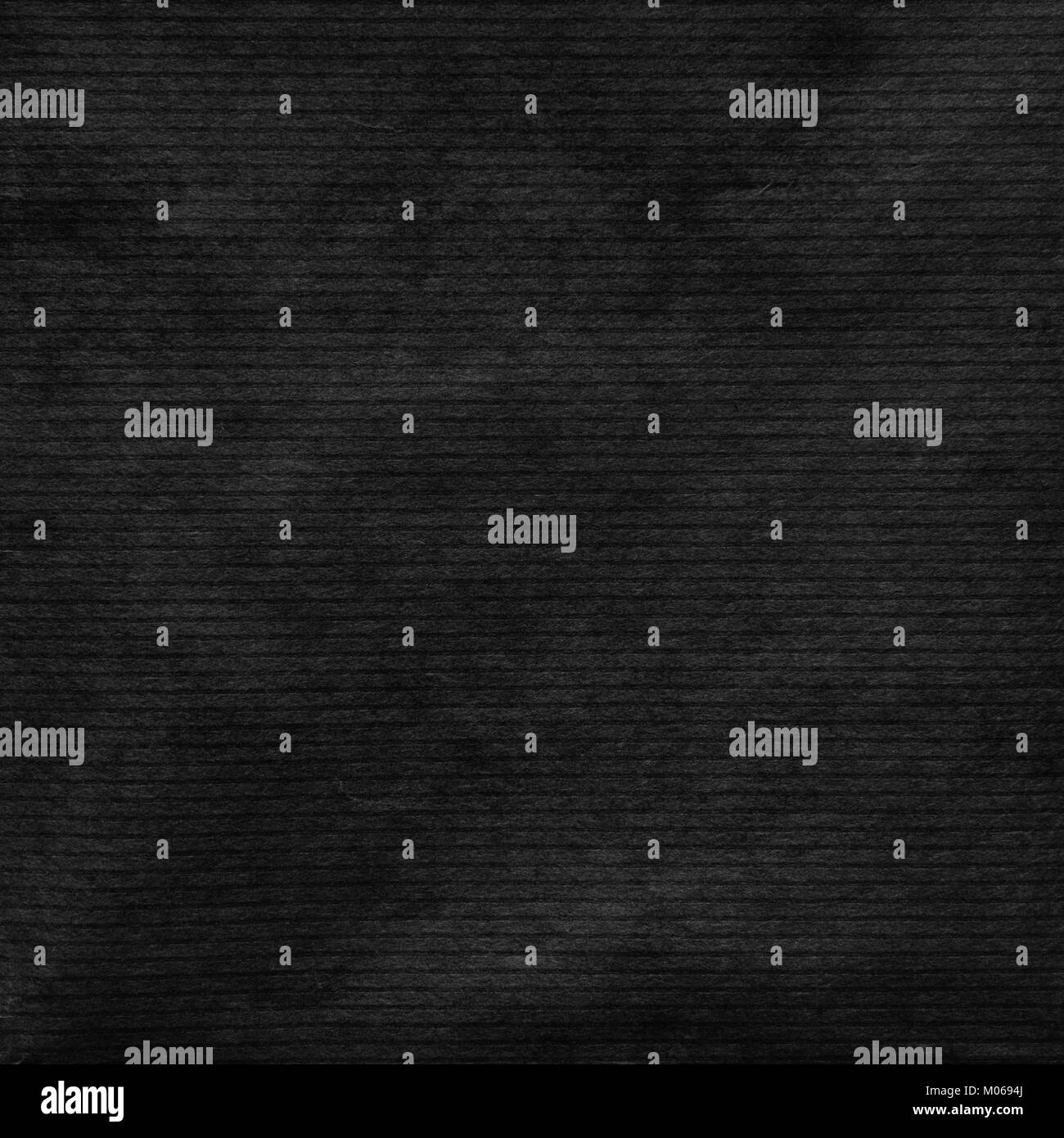 La texture di nero nervati di carta o di cartone come semless grunge background. Foto Stock