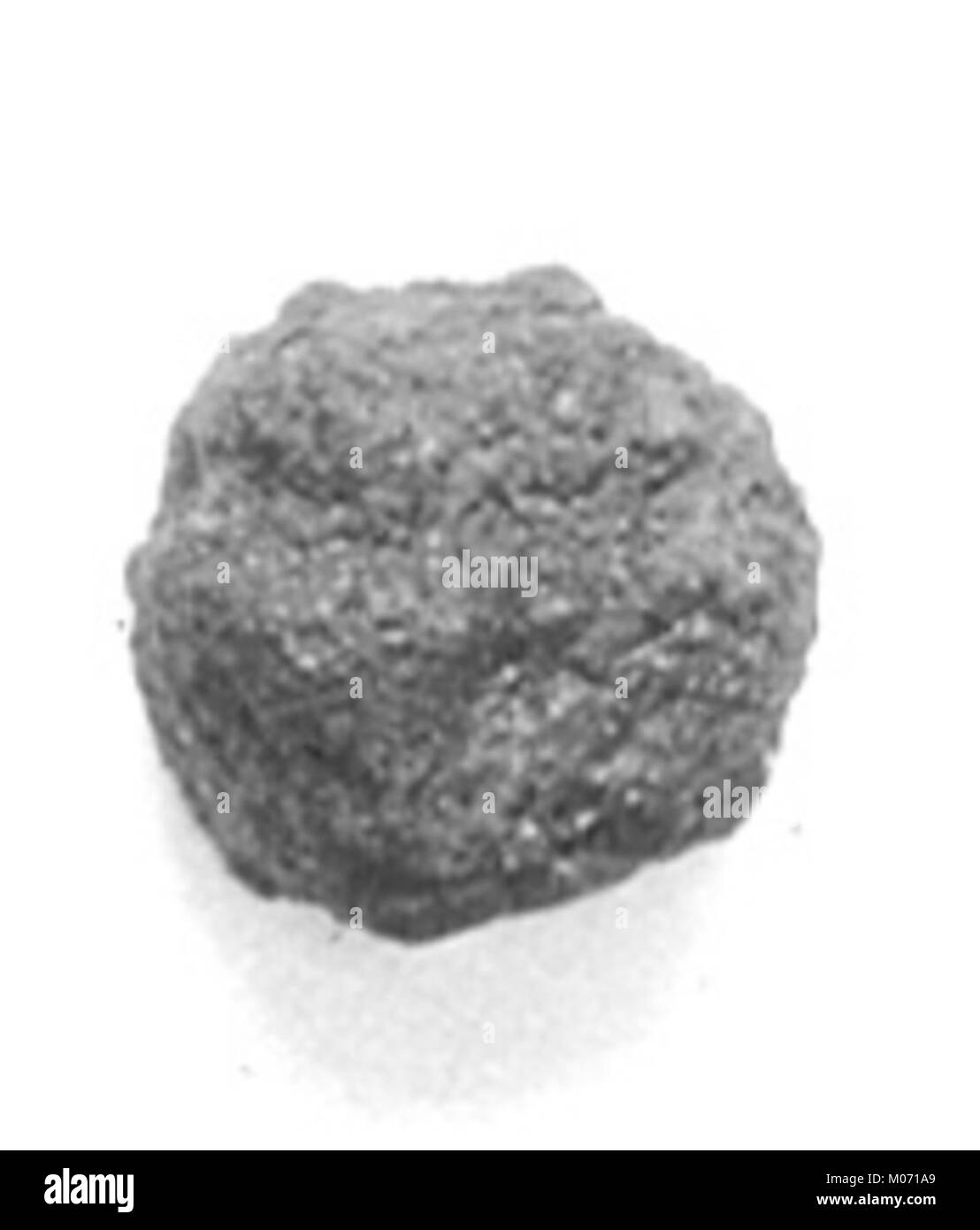 Questo biscotto ipocefalo in resina presenta motivi simbolici utilizzati nelle antiche pratiche funerarie egiziane, posto sotto la testa del defunto per protezione. Foto Stock