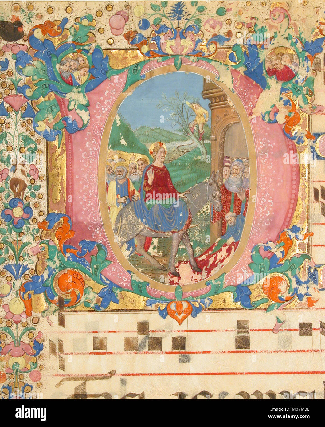 La foglia del manoscritto raffigura l'entrata a Gerusalemme la domenica delle Palme in una D iniziale, mostrando l'illuminazione medievale, il simbolismo liturgico e l'iconografia cristiana in modo graduale. Foto Stock