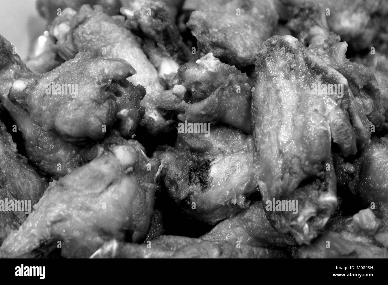 Ali di pollo in B & W Foto Stock