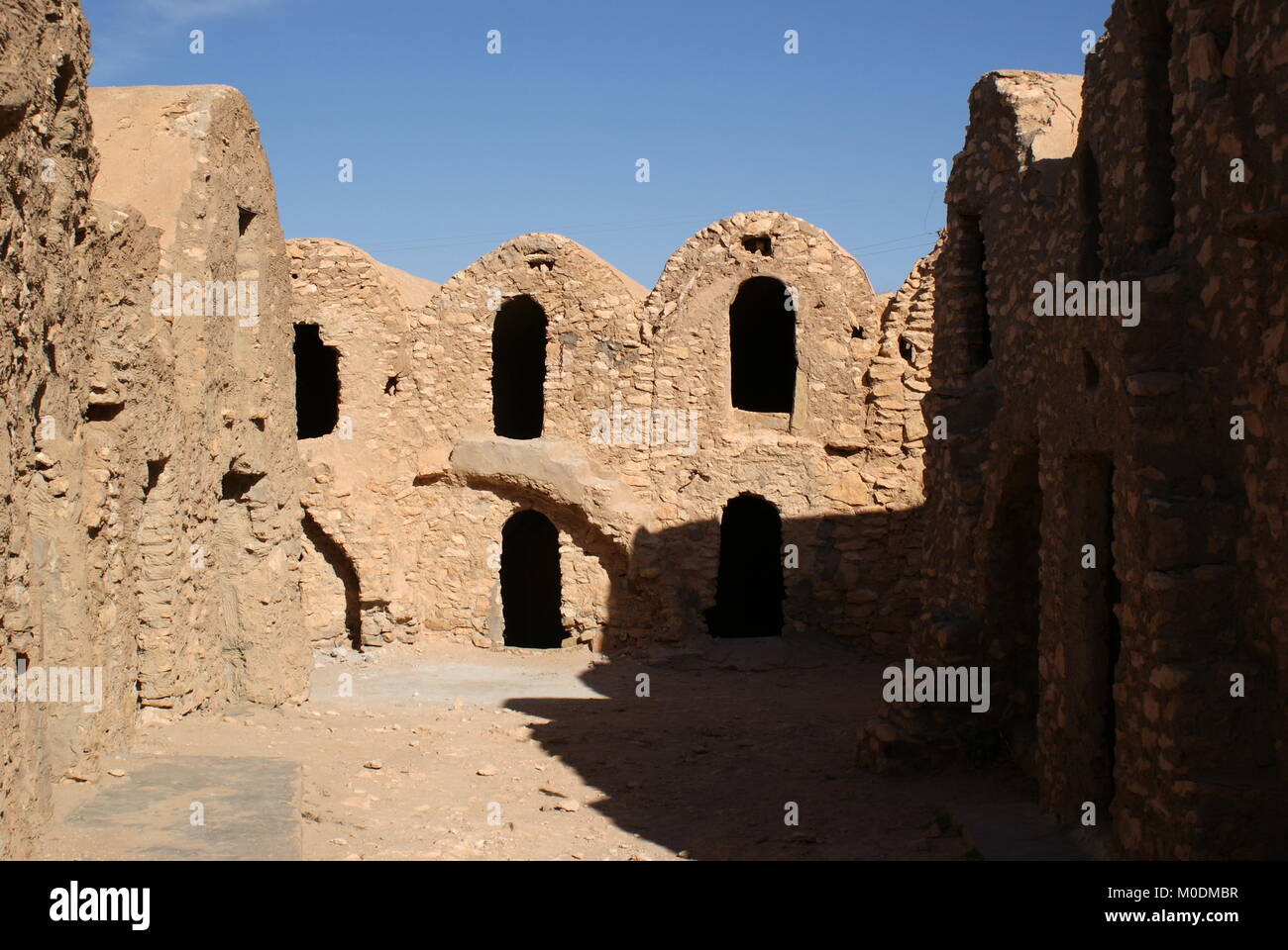 Ksar Hadada, vecchio granaio fortificato, distretto di Tataouine, Tunisia Foto Stock