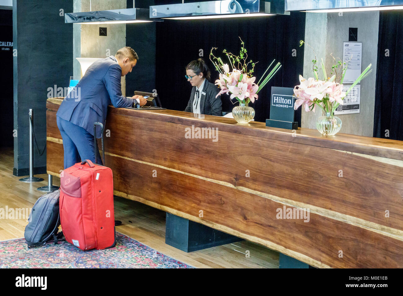 Buenos Aires Argentina,San Telmo,Almacen Anselmo Curio Collection by Hilton,hotel,hall,reception check in reception prenotazione registro Foto Stock