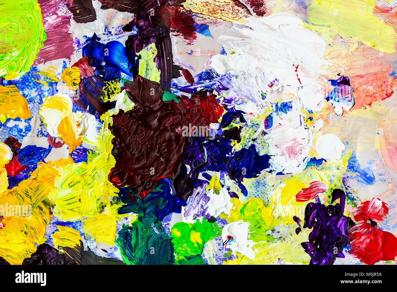 Tavolozza brillante dell artista, texture di misti ad olio vernici di colori diversi e contrastanti, mescolare la presenza di macchie e schizzi di trama per i moderni background creativo Foto Stock