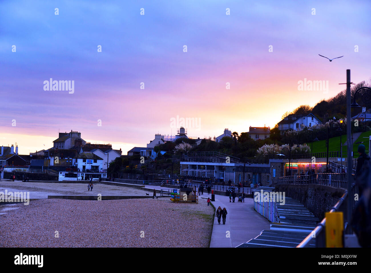 Lyme Regis spiaggia al tramonto, DORSET REGNO UNITO Foto Stock