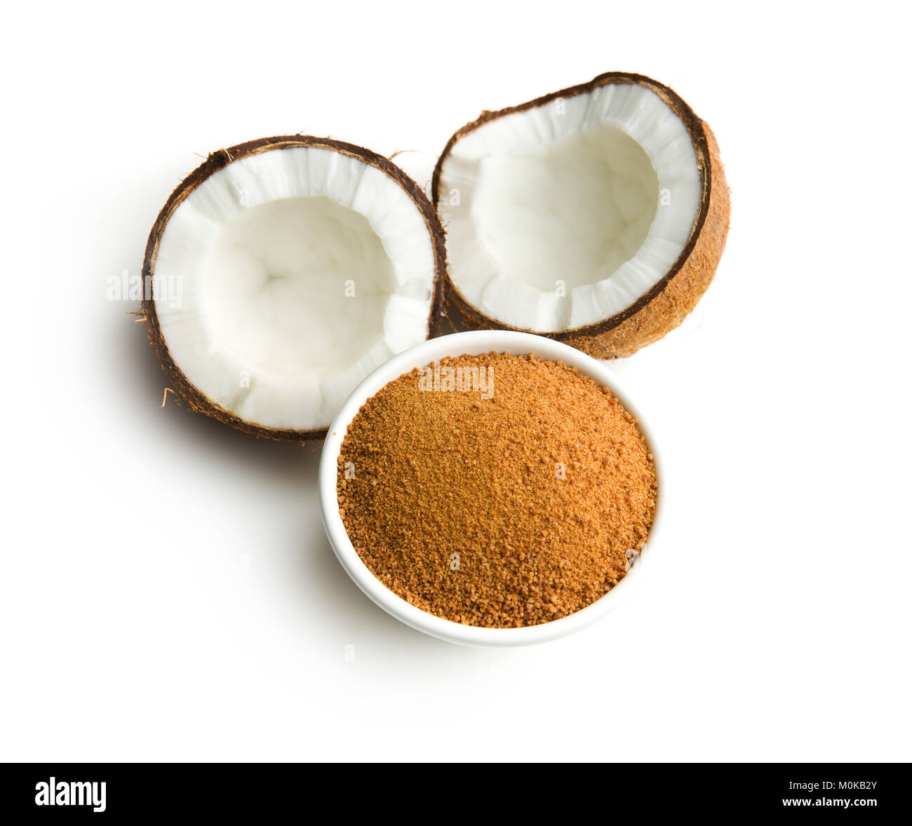 Dolce zucchero di cocco nel recipiente isolato su sfondo bianco. Foto Stock