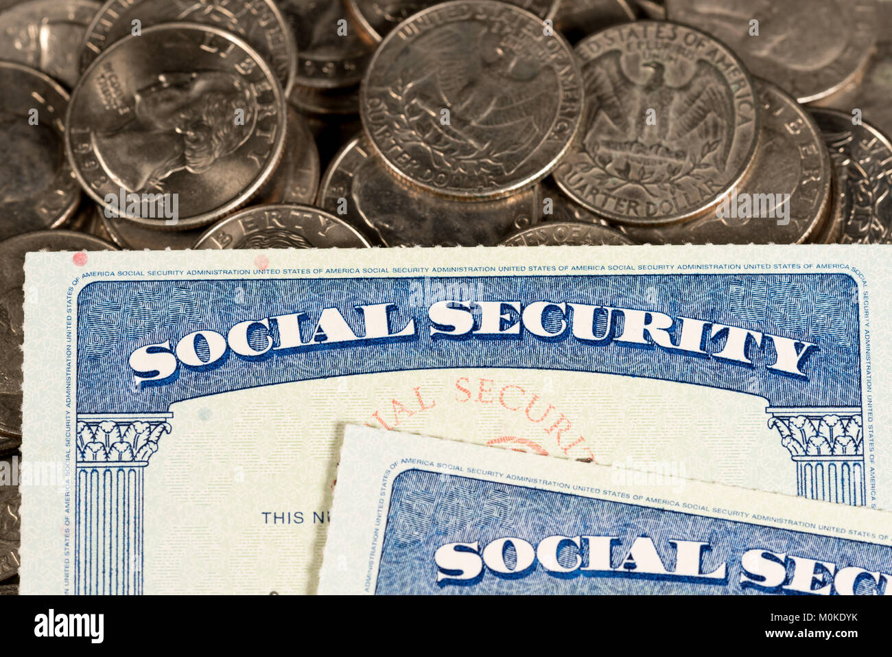 Stati Uniti d'America sociale le schede di sicurezza prevista sul trimestre delle monete in euro Foto Stock