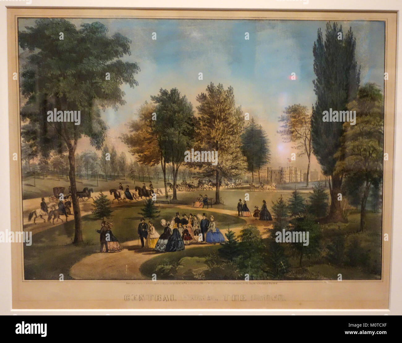 Questa litografia colorata a mano di Currier & Ives mostra il Drive in Central Park, New York City, catturando una scenografica scena invernale con carrozze trainate da cavalli. Le opere d'arte non ondulate mettono in risalto la bellezza del parco e il ritmo tranquillo della vita nella New York del XIX secolo. Foto Stock