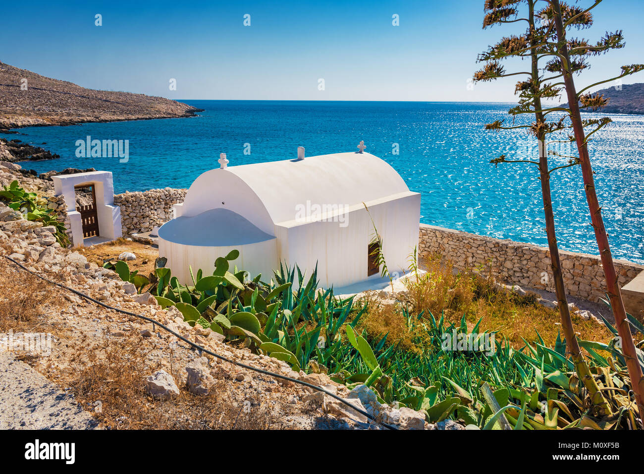 Piccola cappella ortodossa vicino a spiaggia Pontamos sull isola di Halki (Grecia) Foto Stock