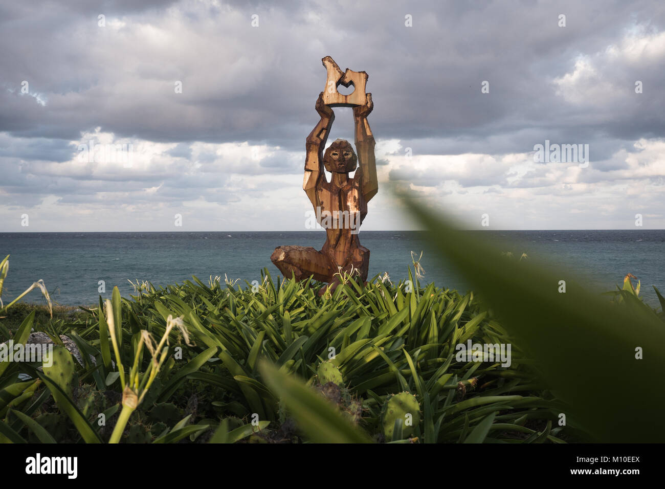 Sculture e tramonto a La Punta Sur,Isla Mujeres, Messico Foto Stock